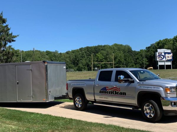 gray AmeriClean work truck and trailer